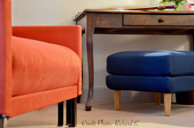 Chauffeuse orange pouf bleu hotel hannah elizabeth interior design